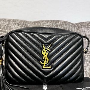 “Sold”. No longer available. 

Saint Laurent Black Chevron Crossbody Bag